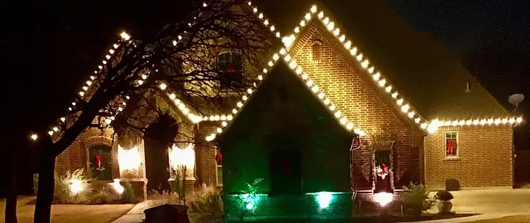 Professional holiday Christmas lights on a home