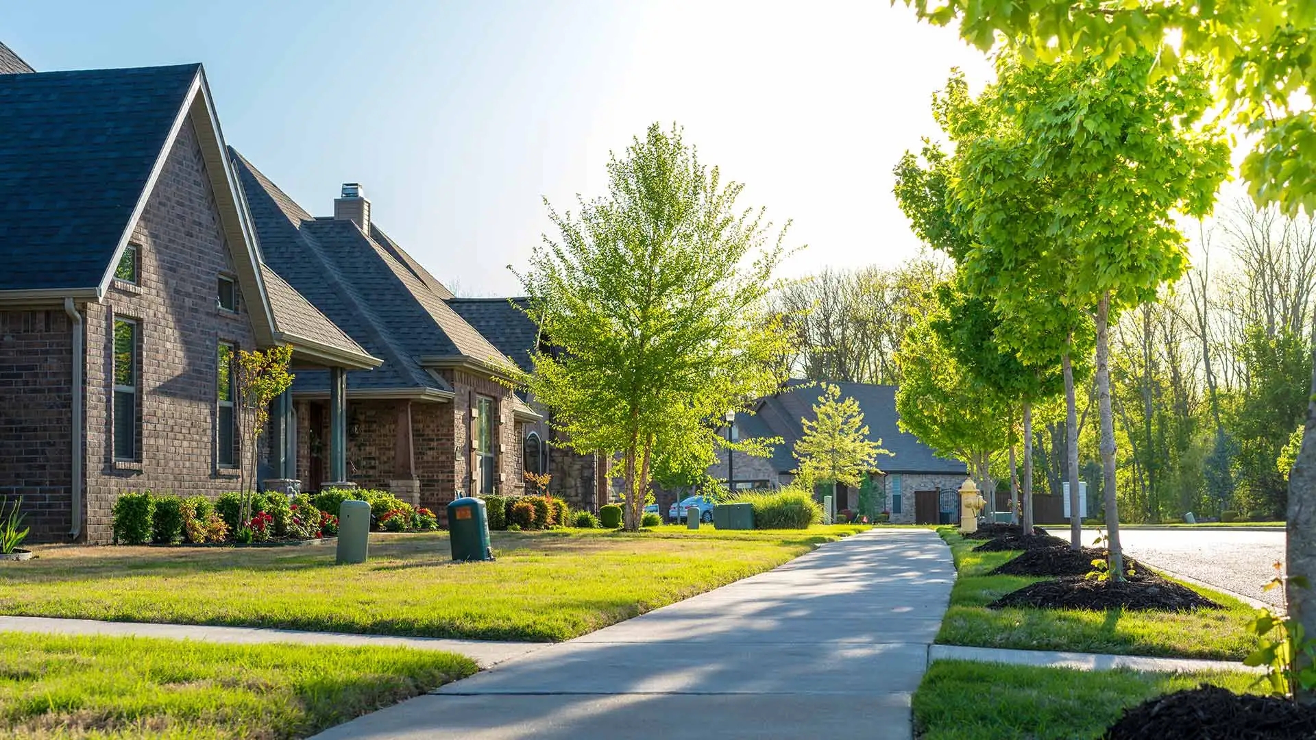 Residential neighborhood street and yards in Fort Worth, TX
